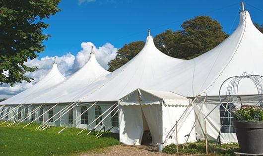 a line of portable restrooms in a shaded area, offering a comfortable experience for users in Mountain Home ID